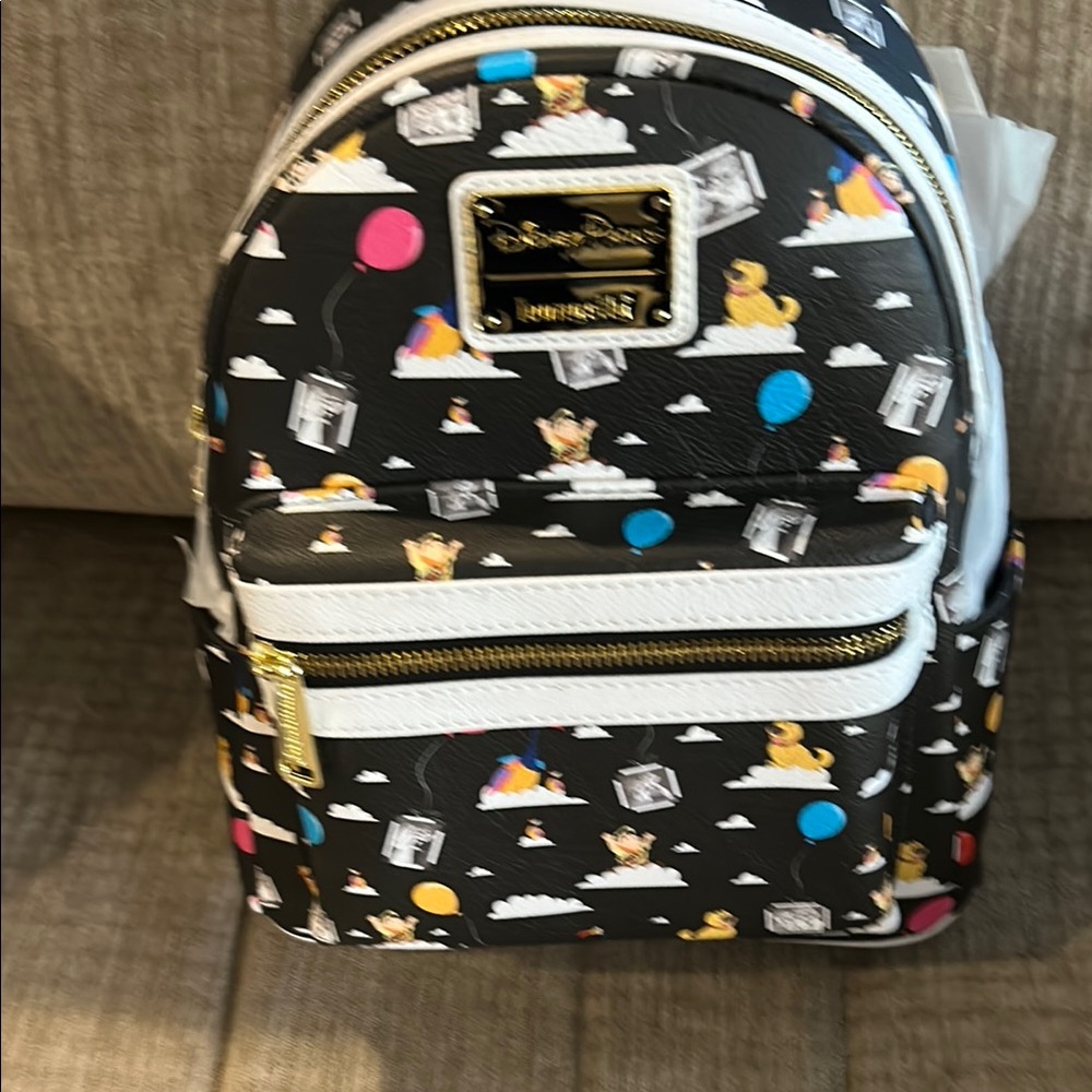 Disney’s up lounge fly Black and white backpack brand new tags on